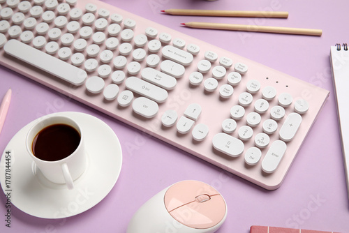 Pink computer keyboard and ...