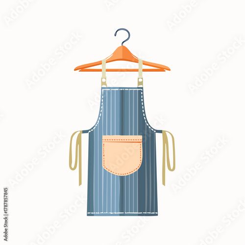 Cotton apron hanging on hook