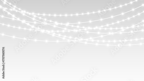 Garland hanging Christmas festive bulbs and lights with ribbon decoration for holiday banner.
