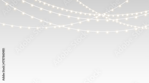 Garland decorated with fairy lights and glowing bulbs for Christmas holiday festive banner.
