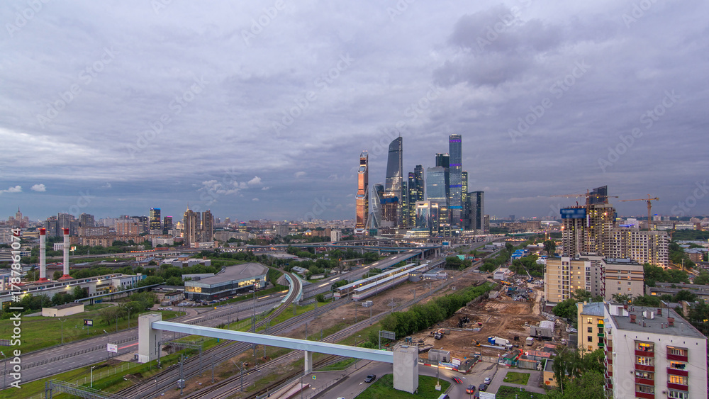 Fototapeta premium Business complex of skyscrapers Moscow city day to night timelapse.