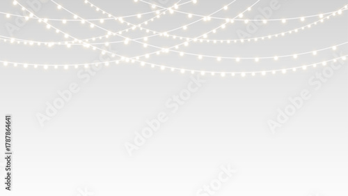 Garland glowing christmas festive bulbs and ribbons for winter party card.
