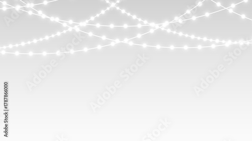 Garland glowing lights and festive christmas ribbons on holiday card banner stage decoration.
