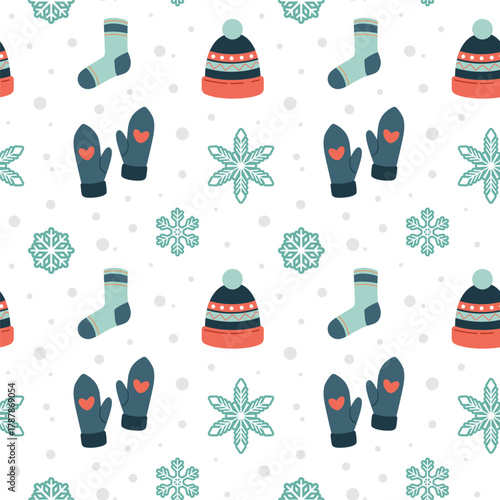 Knitted warm cloth, socks, mittens, hat seamless pattern. Cute winter decoration texture with snowflakes. Vector. Flat design, cartoon style.