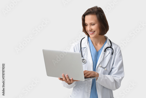 Beautiful female doctor wit...