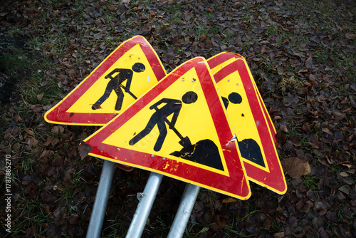 men at work signs on ground