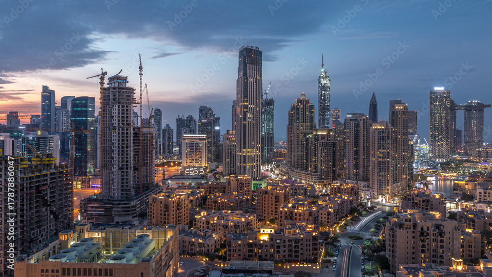 Fototapeta premium Dubai Downtown skyline during sunset timelapse with modern towers panoramic view from the top in Dubai
