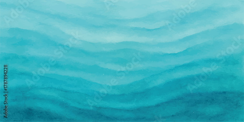 Abstract blue water texture background with a light reflection of the summer sky and ocean waves