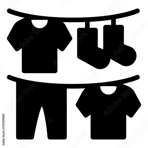 Washed clothes on strings solid icon, washing concept. Vector graphics. Clean linen, laundry sign on white background, style icon mobile or web design.