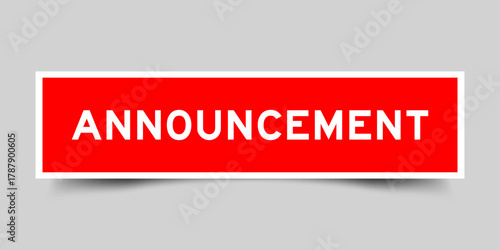 Red color square shape sticker label with word announcement on gray background