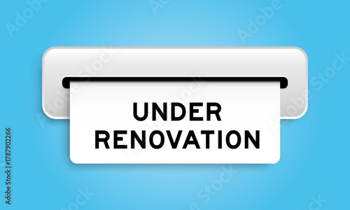 White coupon banner with word under renovation from machine on blue color background