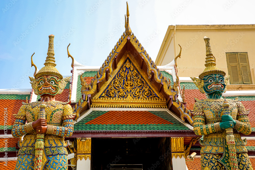 Fototapeta premium Wat Phra Kaew or Wat Phra Sri Rattana Satsadaram is temple used for various royal ceremonies during reign of King Rama I. It is temple within the Grand Palace. Inside temple is the Emerald Buddha.