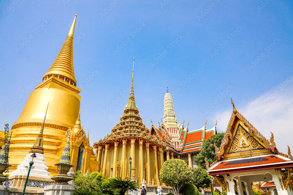 Fototapeta premium Wat Phra Kaew or Wat Phra Sri Rattana Satsadaram is temple used for various royal ceremonies during reign of King Rama I. It is temple within the Grand Palace. Inside temple is the Emerald Buddha.