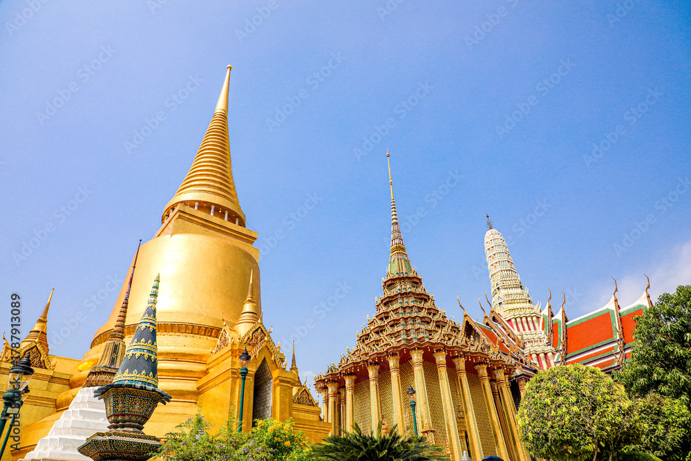 Fototapeta premium Wat Phra Kaew or Wat Phra Sri Rattana Satsadaram is temple used for various royal ceremonies during reign of King Rama I. It is temple within the Grand Palace. Inside temple is the Emerald Buddha.
