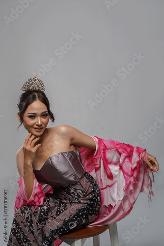 Asian woman in traditional-inspired modern gown