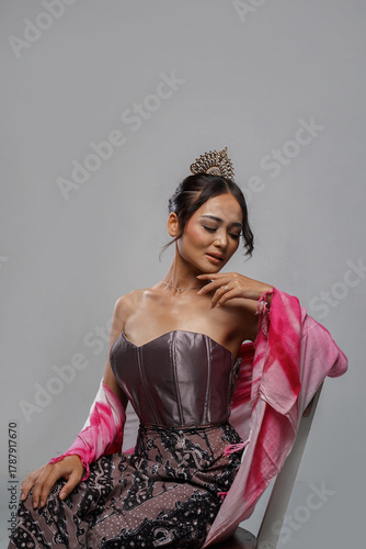 Beautiful Asian woman wearing elegant gown