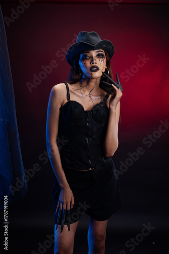 Gothic model posing in black dress
