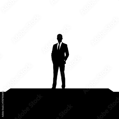 The Unknown Professional

A lone silhouette of a suited man standing in the center of a white frame. The man’s posture is relaxed but self-assured. No details or facial features — just the outline of 