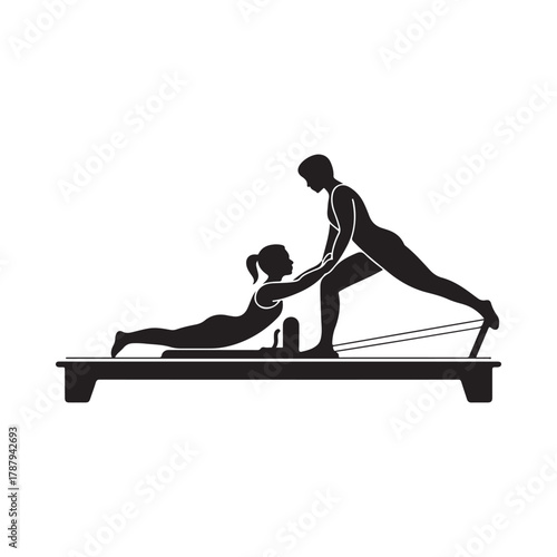 Pilates instructor assisting client on reformer machine