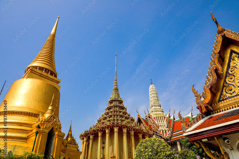Fototapeta premium Wat Phra Kaew or Wat Phra Sri Rattana Satsadaram is temple used for various royal ceremonies during reign of King Rama I. It is temple within the Grand Palace. Inside temple is the Emerald Buddha.