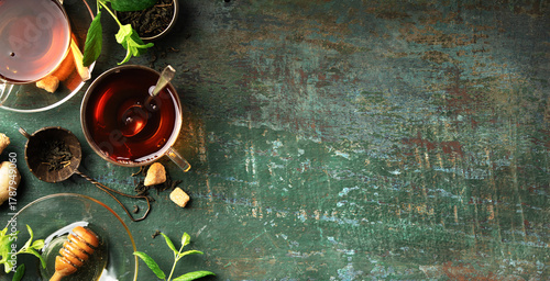 Herbal Tea with Lemon, Ginger, Mint, and Honey on Rustic Background