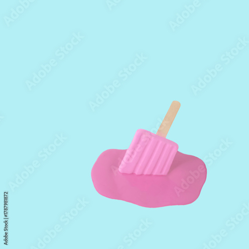 Melted pink ice cream on a pastel blue background. Minimalistic food concept.