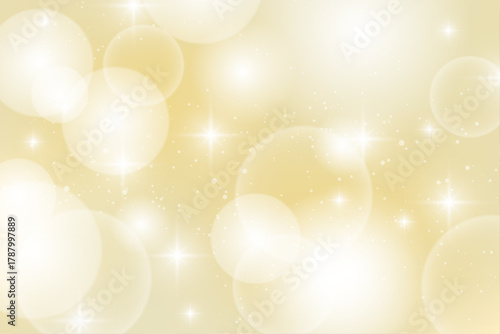 キラキラ輝くゴールドの光と幻想的なぼかし背景