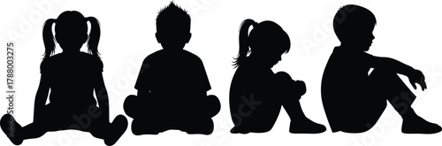 Four sitting children silhouettes group isolated on white background