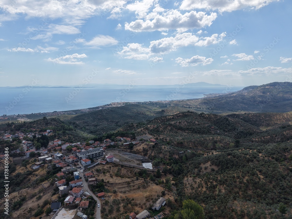 Obraz premium Aerial View of a Peaceful Coastal Town