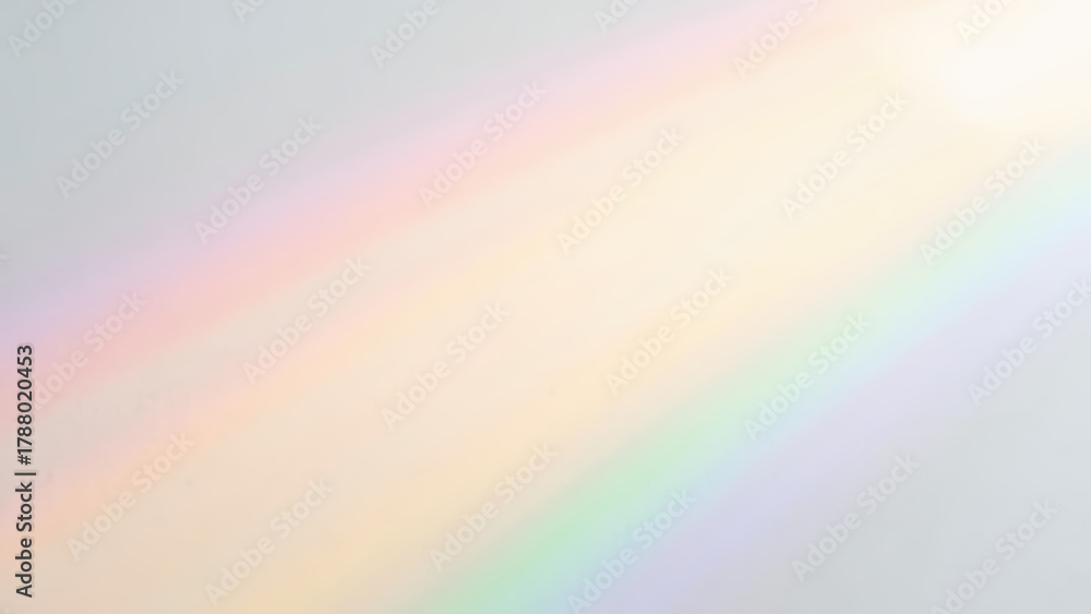 Naklejka premium Beautiful spectrum of colors appears as rainbow on light background, creating serene and calming atmosphere