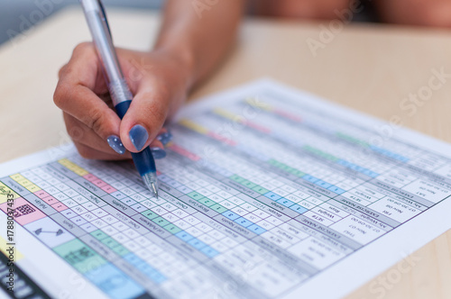 Wallpaper Mural Analyzing data trends business meeting insights office document review professional close-up Torontodigital.ca