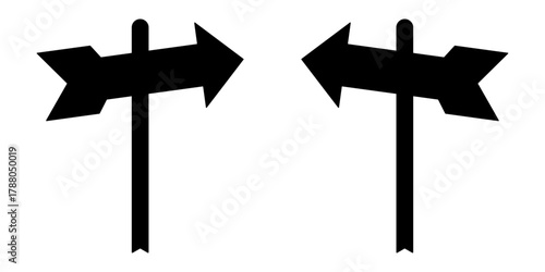 directional arrow signs on posts pointing left and right choice or decision symbol.