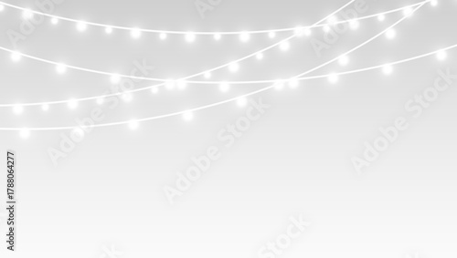 Garland festive decoration glowing christmas ribbons and bulbs for celebration card.
