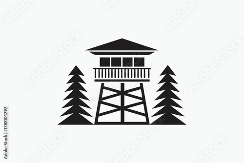 Iconic lookout tower silhouette surrounded by pine trees evokes natural protection and forestry