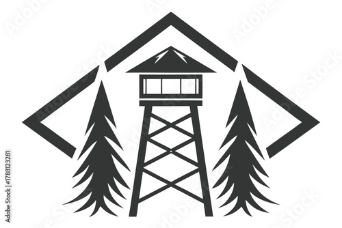 Tower watching over the wilderness, pine trees, and mountain range create scenic view