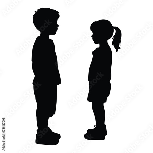 Silhouettes of a boy and girl standing side by side
