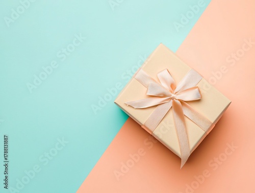 Elegant Gift Box with Ribbon on Pastel Background in Soft Colors