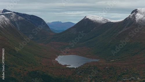 Wallpaper Mural Drone shot of mountain lake surrounded by rugged terrain in Norway Torontodigital.ca