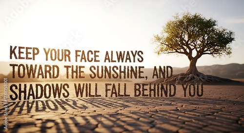 Inspirational quote with tree on cracked earth casting shadows in a bright outdoor setting