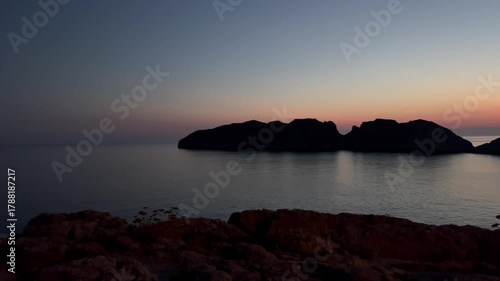 Coastline with ships and young people, Santa Ponsa marina in the evening, Calvia, Mallorca, Spain