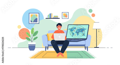 Young man working remotely from home with global network shown on laptop screen