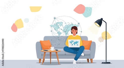 Young woman working remotely with a laptop at home surrounded by travel themed elements