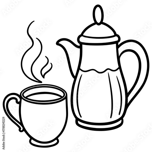 Steaming coffee cup next to a coffee pot