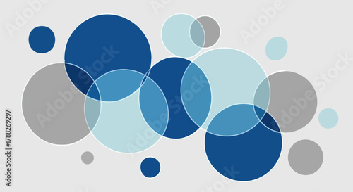 Abstract circles overlap in shades of blue and gray