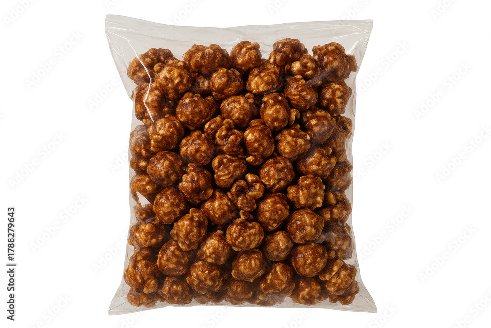 Obraz premium Caramel popcorn in a clear plastic bag, sweet dessert snack for movie nights, party treats, and leisure time