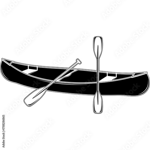 Classic canoe and paddles ready for serene water adventures and outdoor exploration