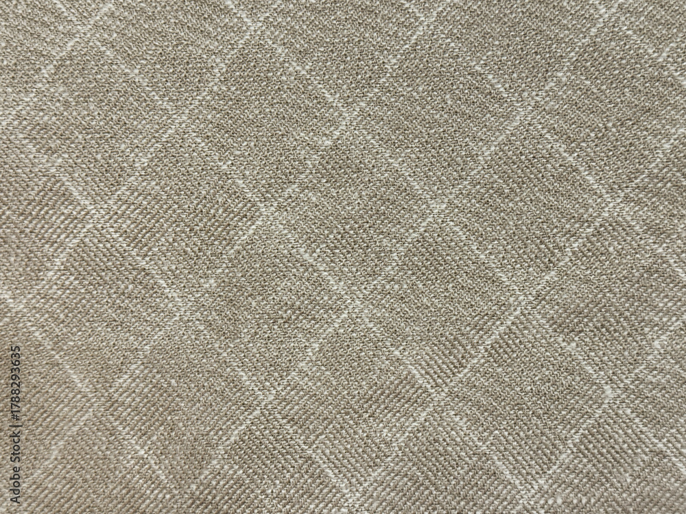 Fototapeta premium Close up of fabric with diamond pattern, in grey and beige color. Suitable for fabric, upholstery, drapery, cloth, or wallpaper. Seamless background texture.