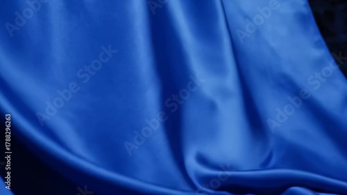 Elegant Blue Fabric Waves A Smooth and Serene Visual.