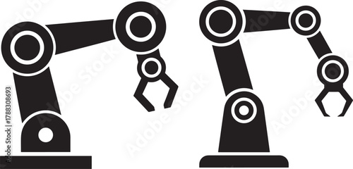 Two industrial robot arms silhouette