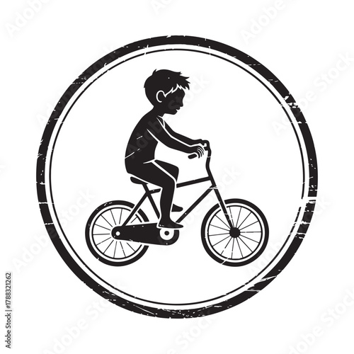 Silhouette of a child riding a bicycle inside a circular stamp